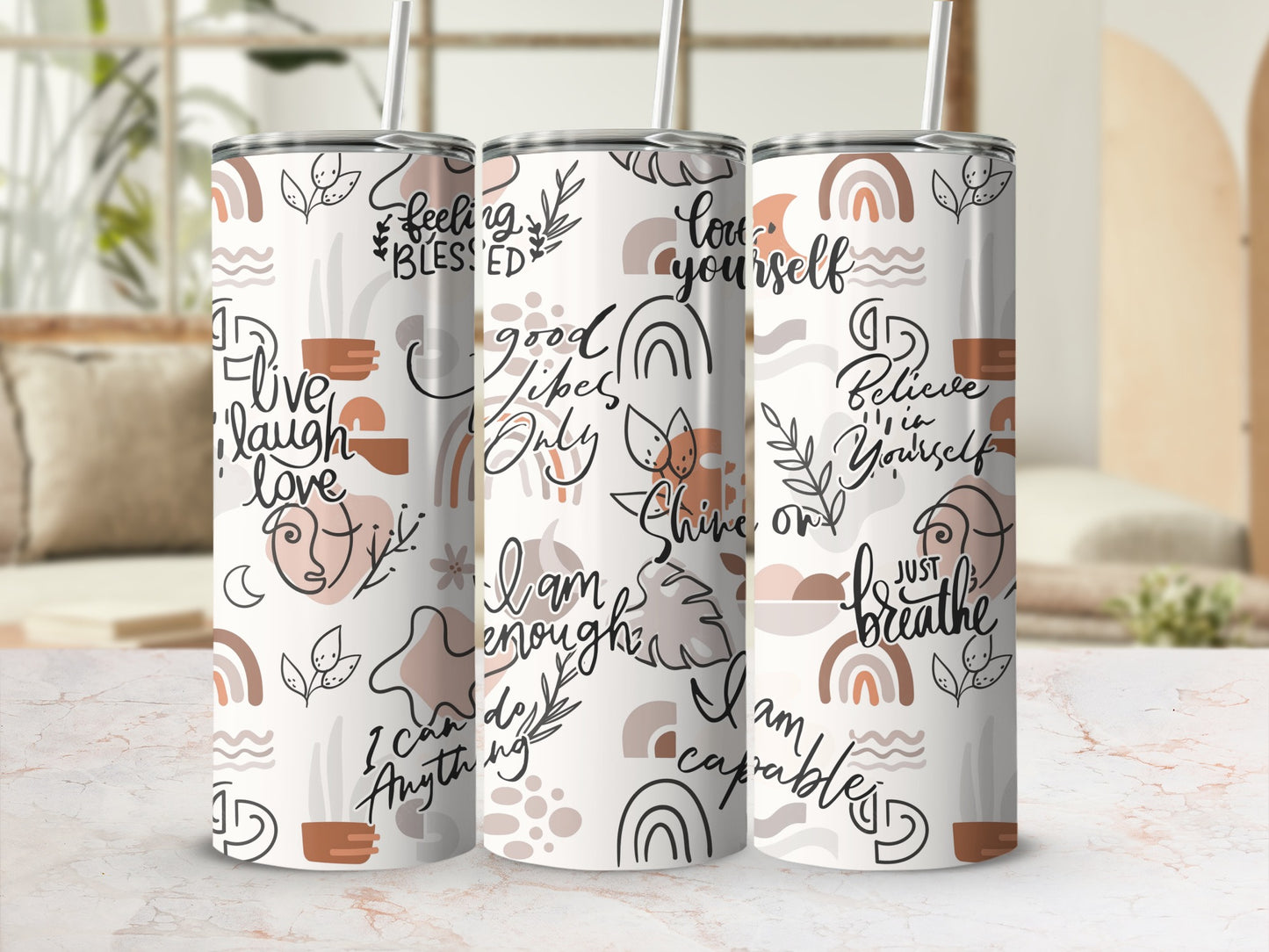 Two tumblers with boho rainbow and inspirational text designs.