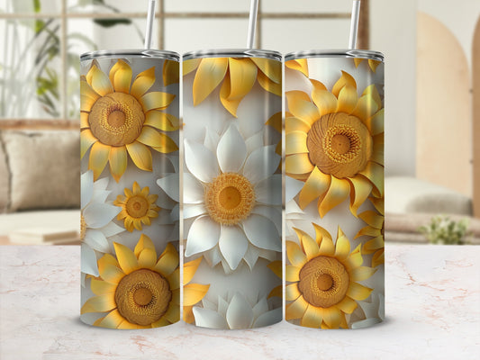 Three stainless steel tumblers with sunflower and white flower designs.
