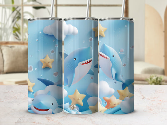 Three shark-themed tumblers with cartoon sharks, clouds, and stars on a white surface.
