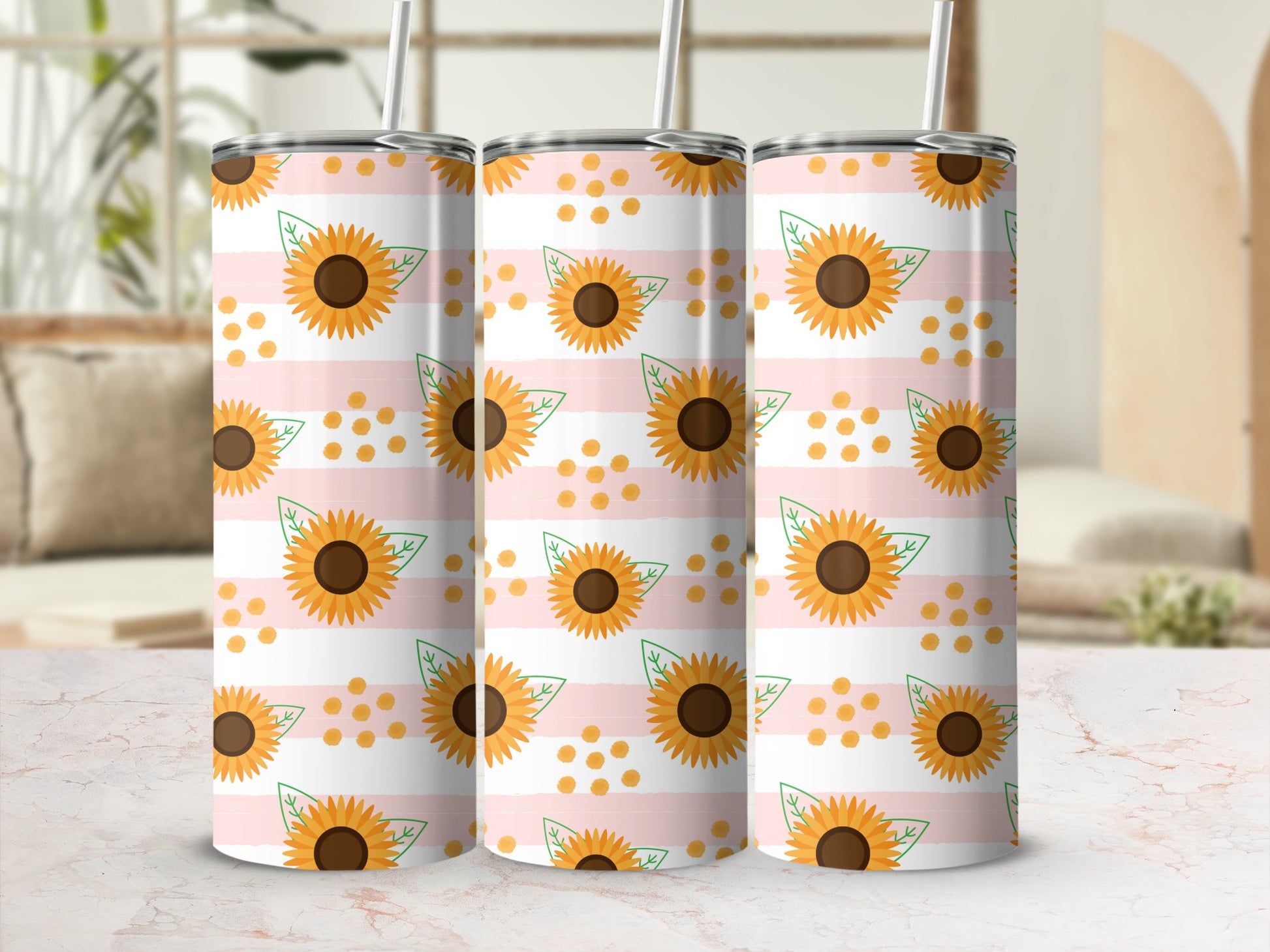 Three tumblers with a pink and white striped pattern and sunflowers.