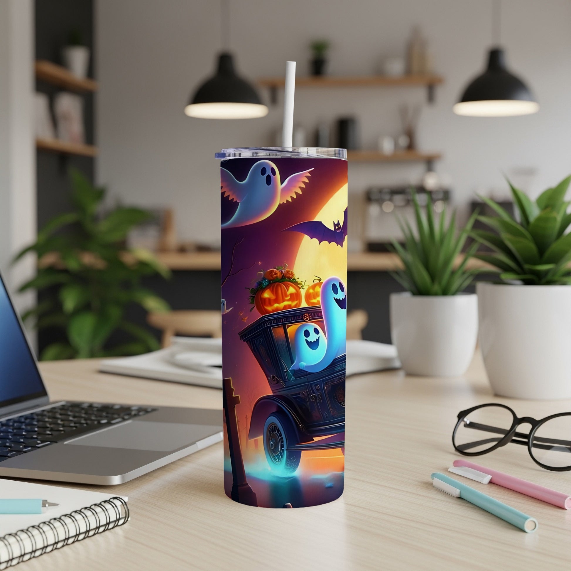 Tumbler with Halloween ghosts, pumpkins, a hearse, and a bat on a purple and orange background.