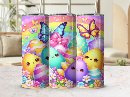 Easter eggs with butterfly and rainbow designs on tumblers.