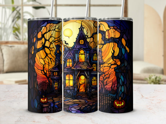 Haunted house with pumpkins and moon, stained glass style tumbler design.