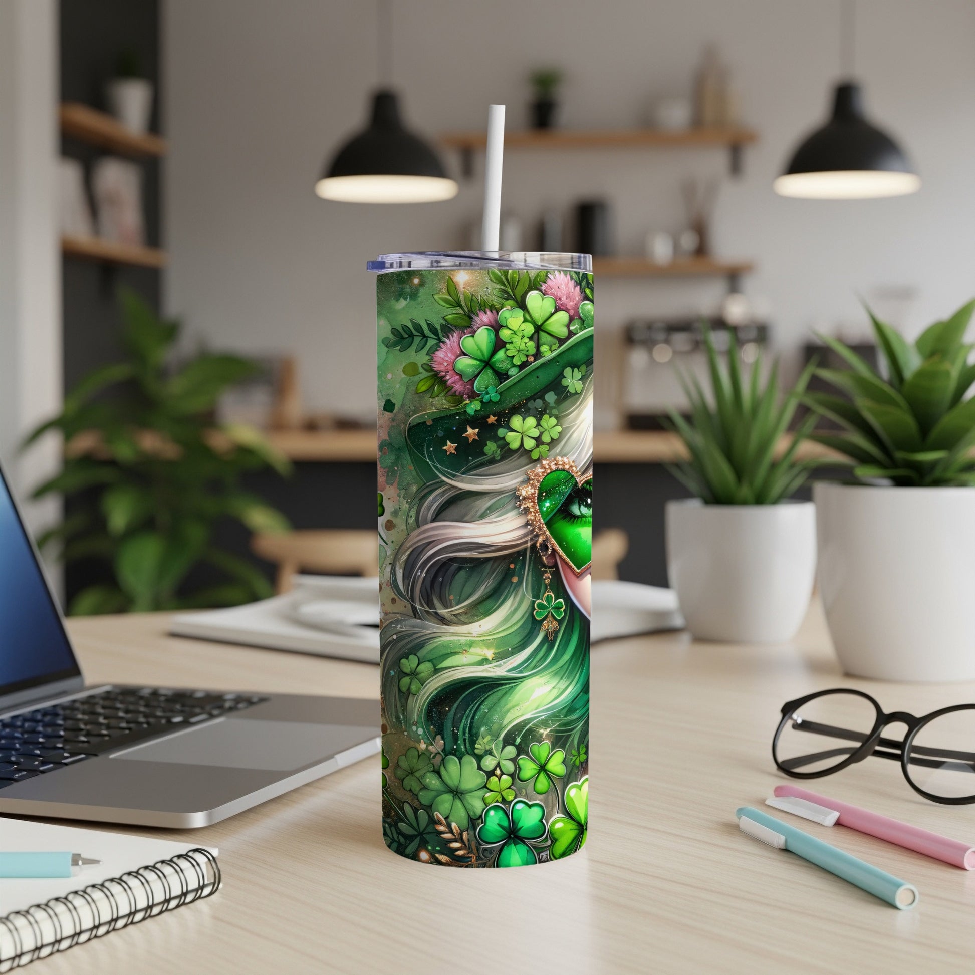Green tumbler with shamrock and clover designs, featuring a woman's face.