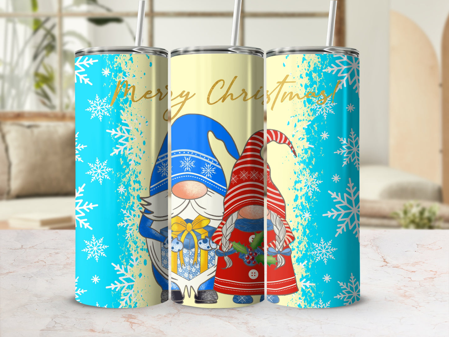 Two gnomes with gift, "Merry Christmas" text, and snowflakes on tumblers.
