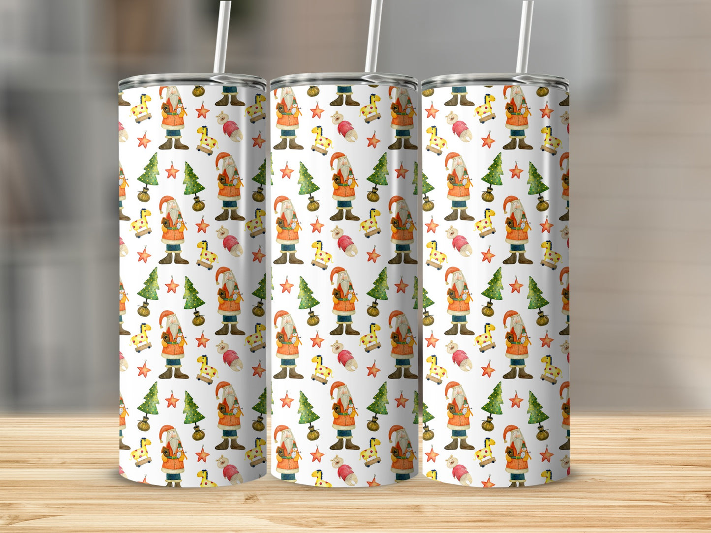 Three tumblers with repeating holiday pattern of gnomes, Christmas trees, and snowflakes.
