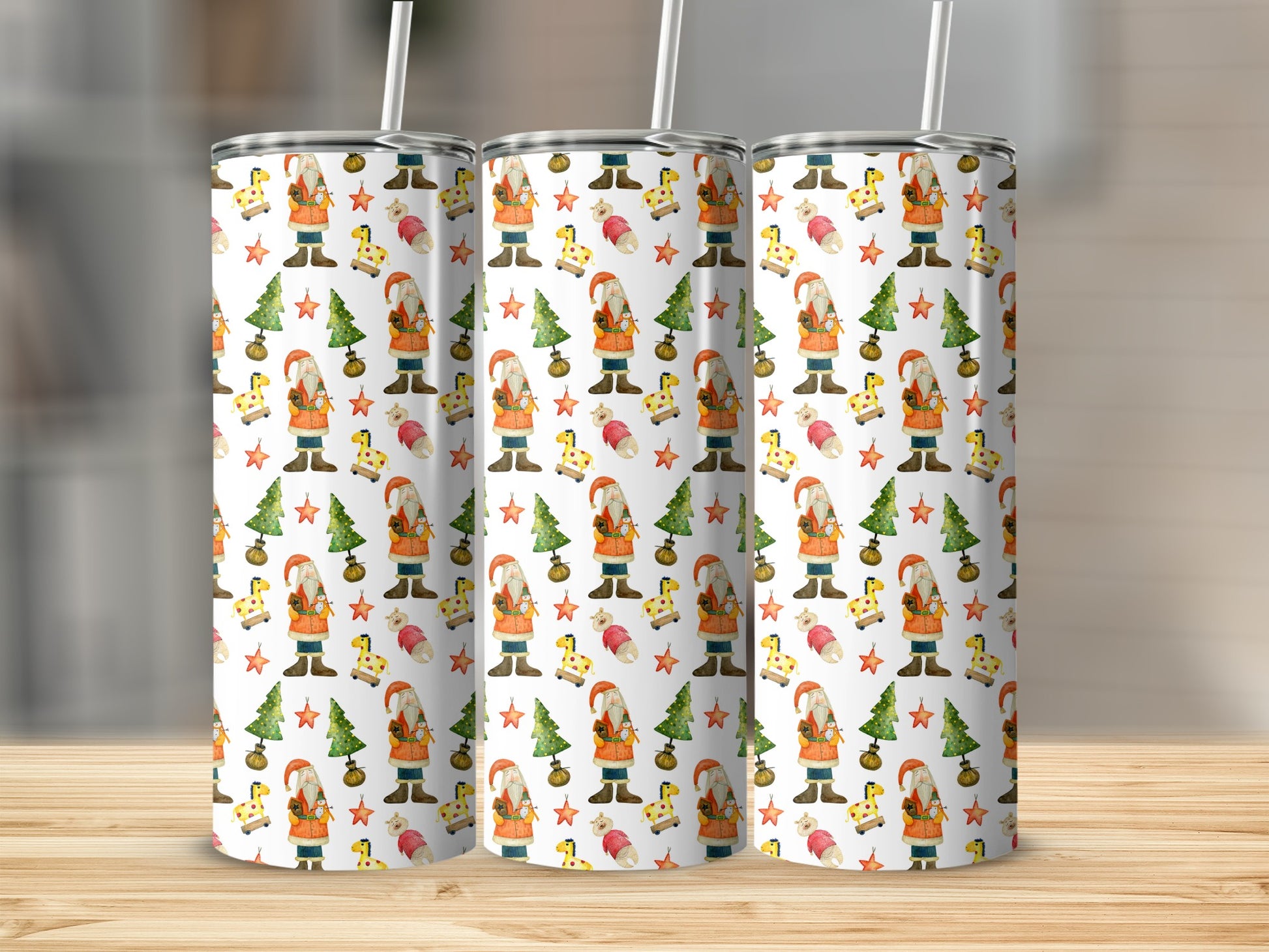 Three tumblers with repeating holiday pattern of gnomes, Christmas trees, and snowflakes.