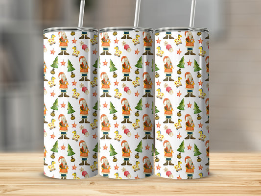 Three tumblers with repeating holiday pattern of gnomes, Christmas trees, and snowflakes.