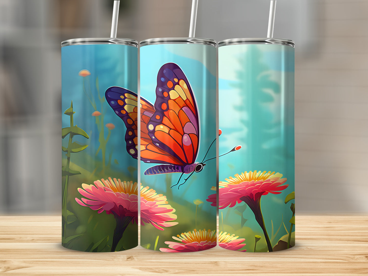 Three tumblers featuring a butterfly and pink flowers, with a blurred green background.