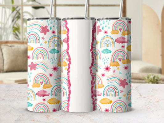 Three tumblers with rainbow, cloud, and star pattern.
