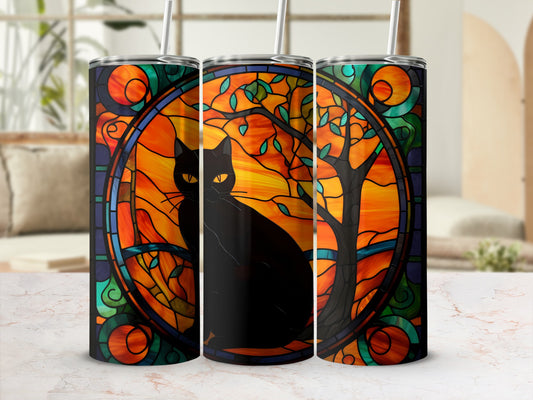 Black cat with stained glass tree design on three tumblers.