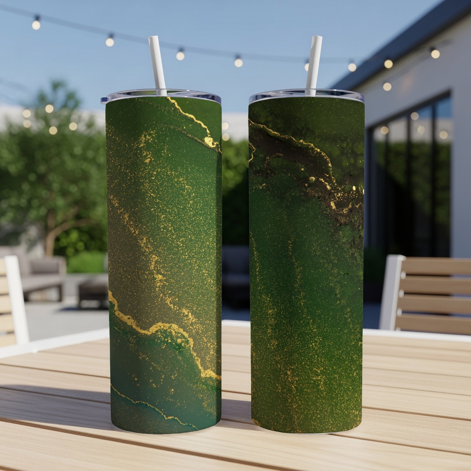 Two tall tumblers with marbled green and gold abstract pattern.