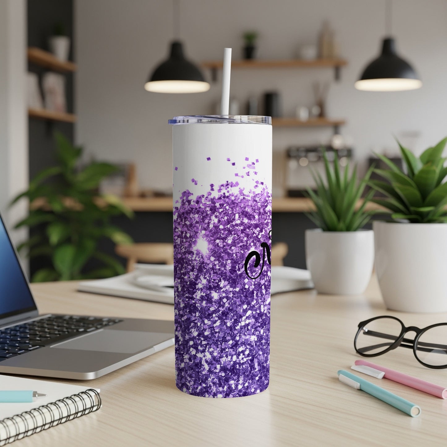 White tumbler with purple glitter and black script text.