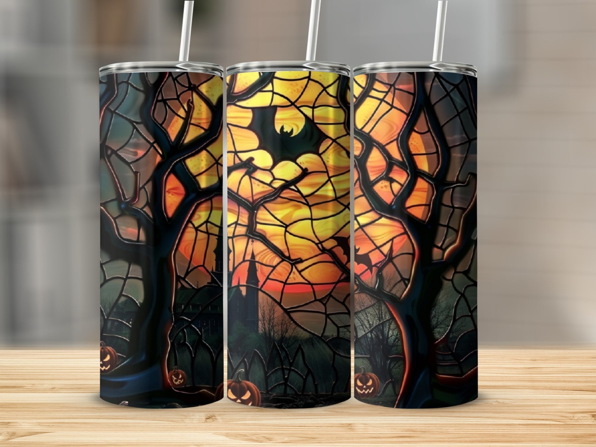 Halloween tumbler with spooky trees, pumpkins, and moon.