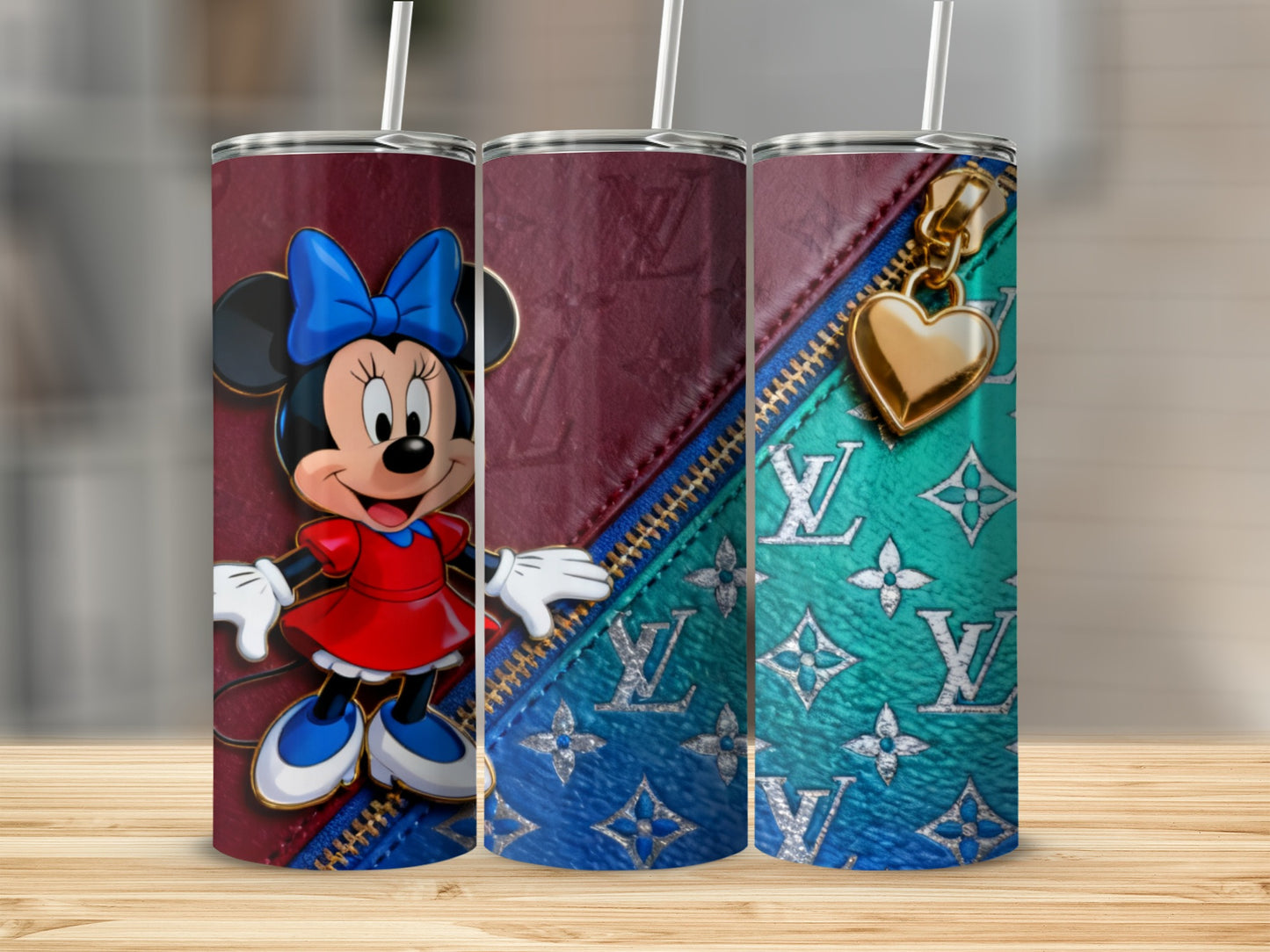 Minnie Mouse on burgundy and teal LV patterned tumbler with gold zipper.