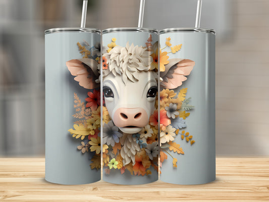 Three tumblers featuring a cow surrounded by colorful flowers.