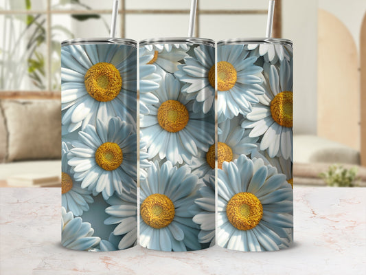 Three tumblers with close-up daisy patterns on a marbled surface.