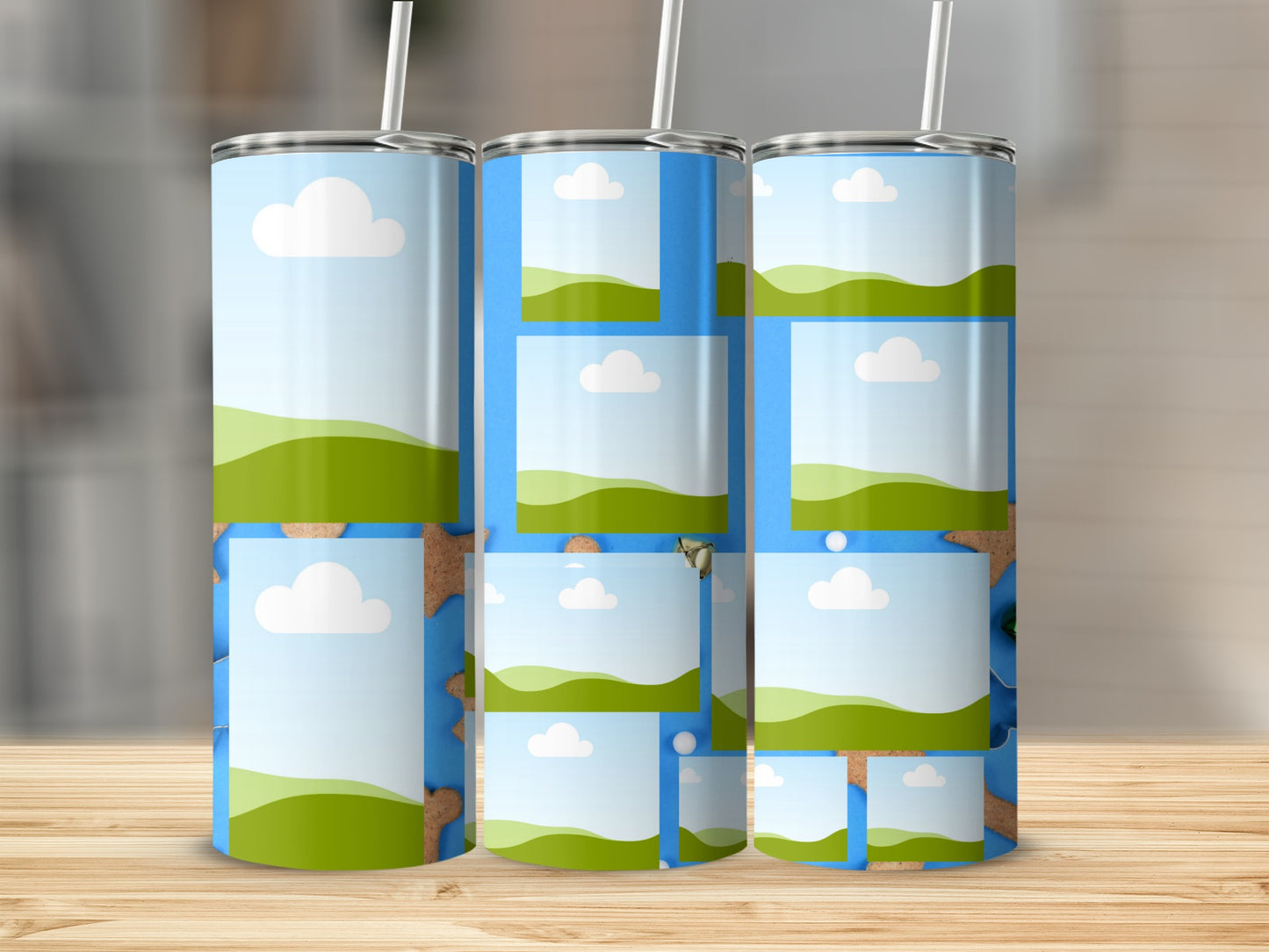 Three tumblers with sky, clouds, and green rolling hills design.