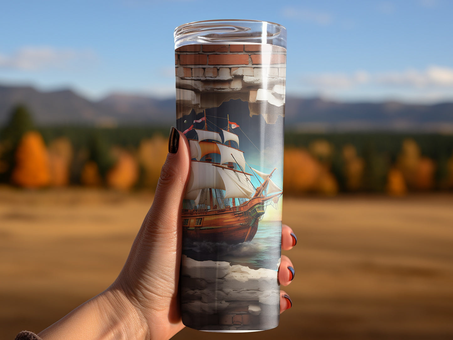 Hand Holding Travel Tumbler with Ship Painting