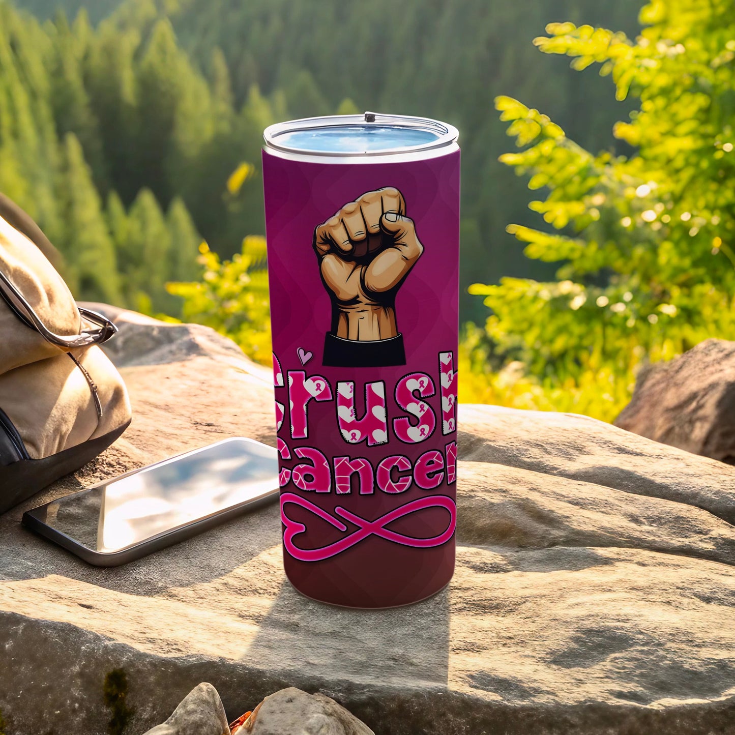 Pink ribbon "Crush Cancer" text on a tumbler with a fist design.