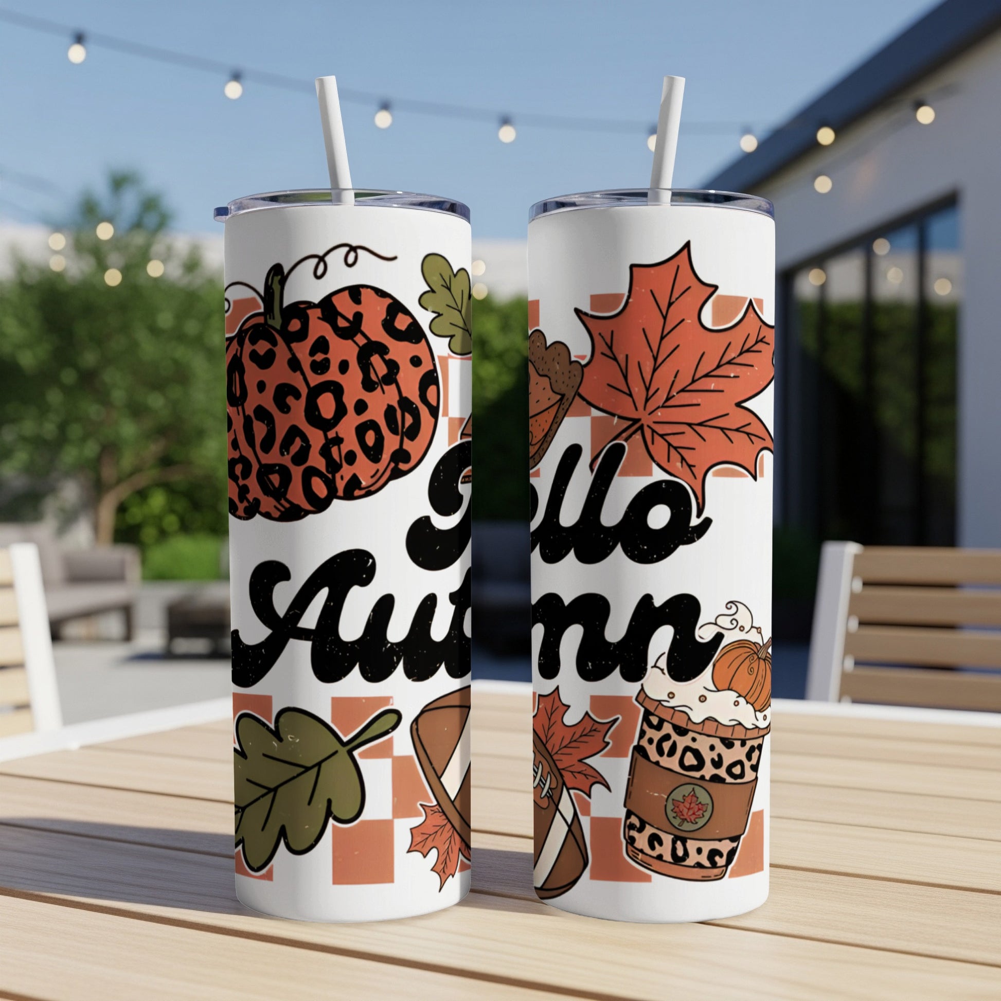 Two tumblers with "Hello Autumn" text, pumpkins, and fall leaves.