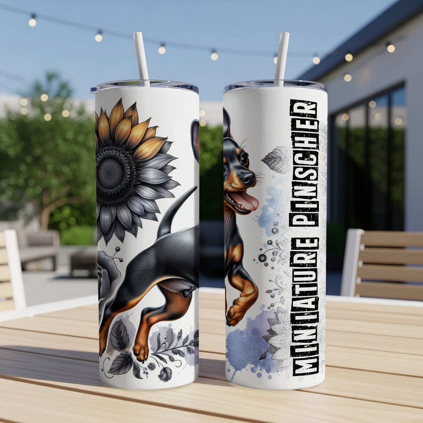 Miniature Pinscher on a tumbler with a sunflower and floral design.