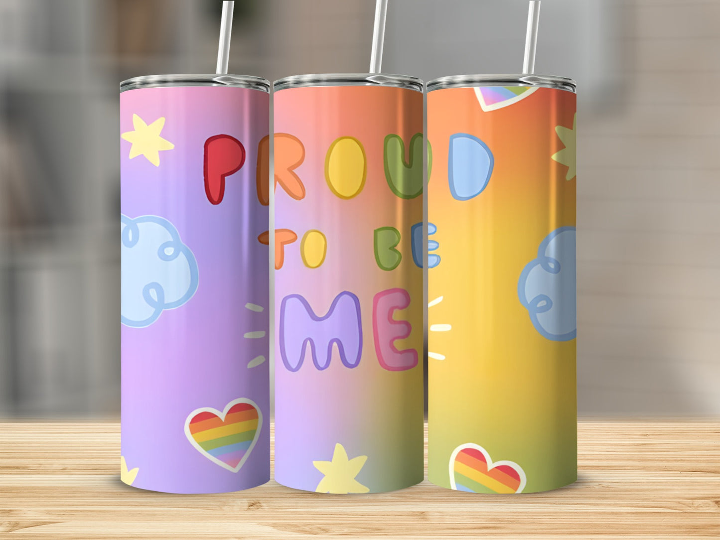 Pride themed tumbler with "Proud to be me" text and colorful clouds and hearts.