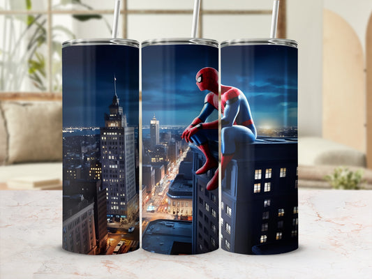 Spider-Man sits on a skyscraper ledge overlooking a nighttime city skyline.