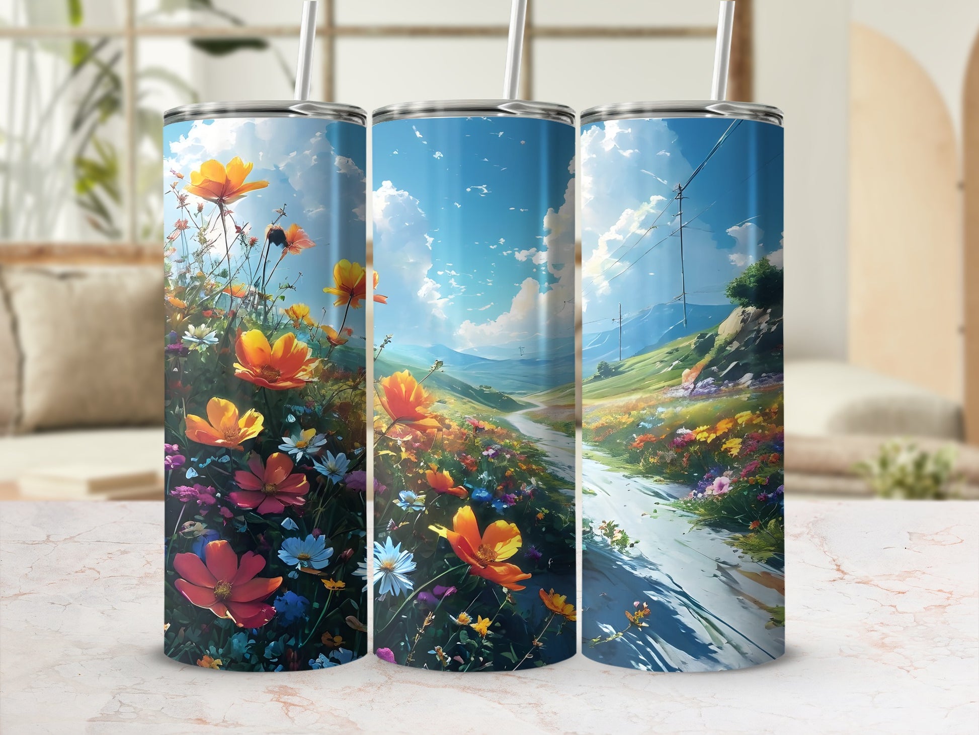Three tumblers featuring a vibrant meadow landscape with wildflowers and a winding path.