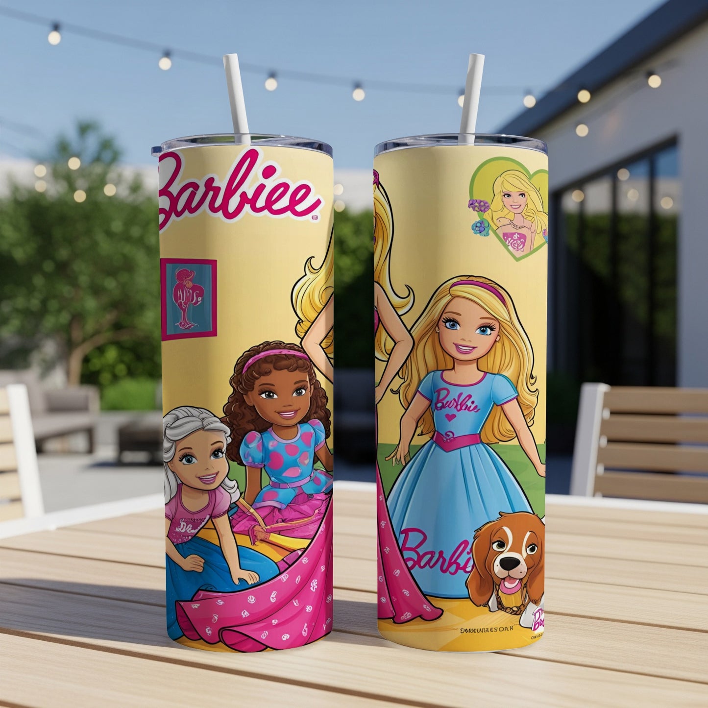 Two Barbie tumblers featuring Barbie and friends with text "Barbie" on a table.