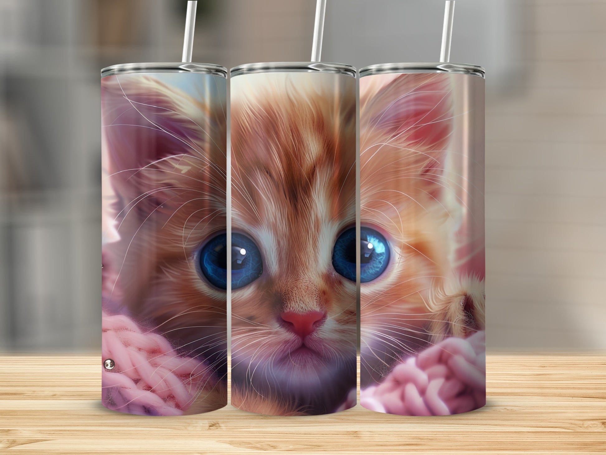 Close-up of a fluffy orange kitten with large blue eyes, wrapped in pink yarn.