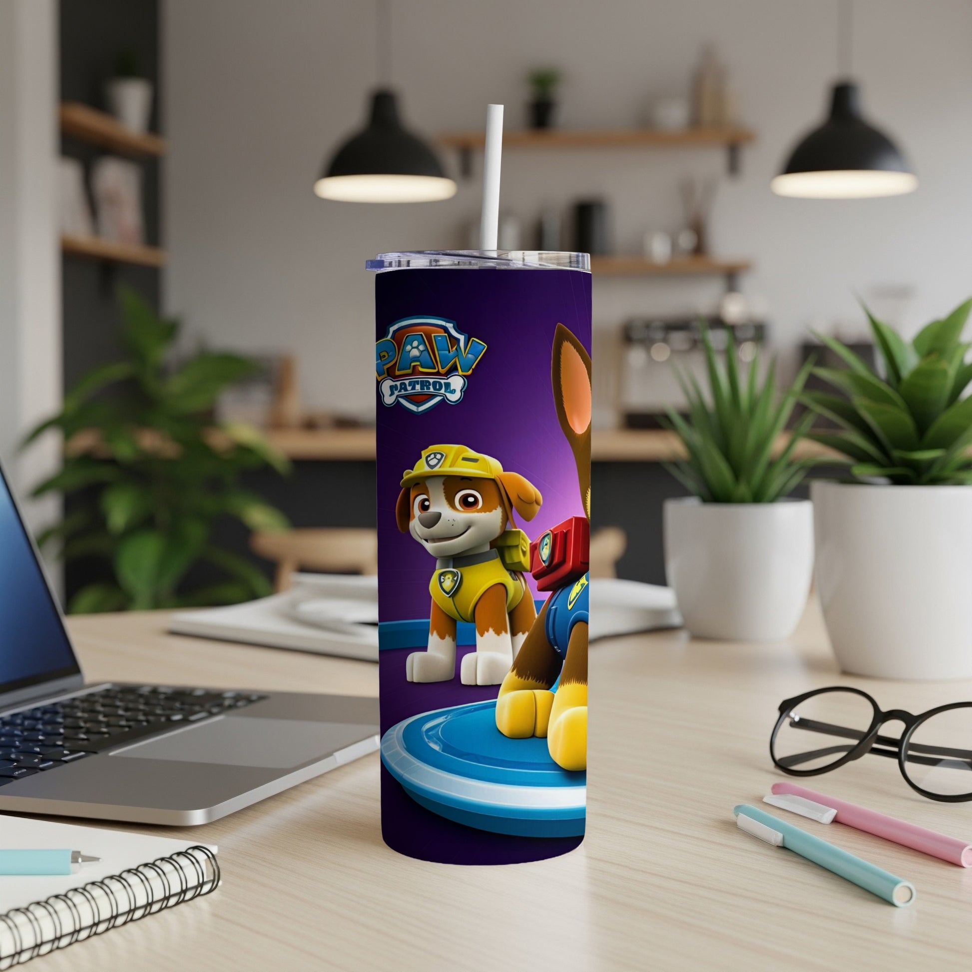 Paw Patrol Chase character on a purple tumbler with a white straw.