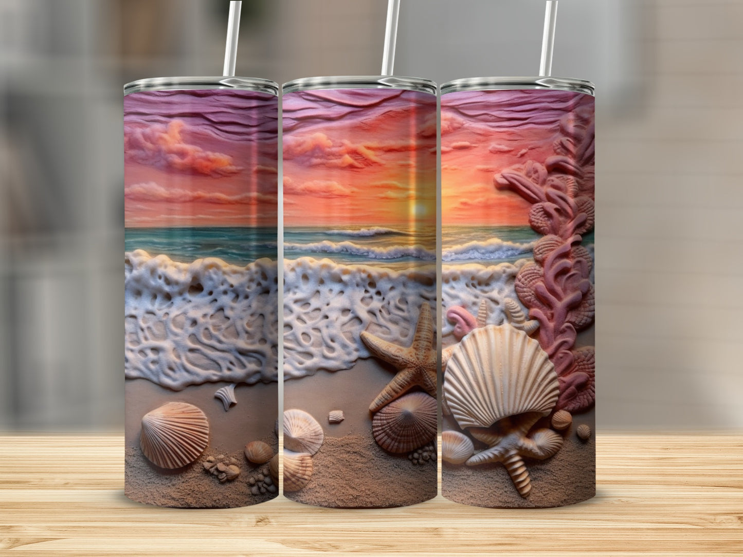 Three tumblers with beach sunset scenes, seashells, and starfish.
