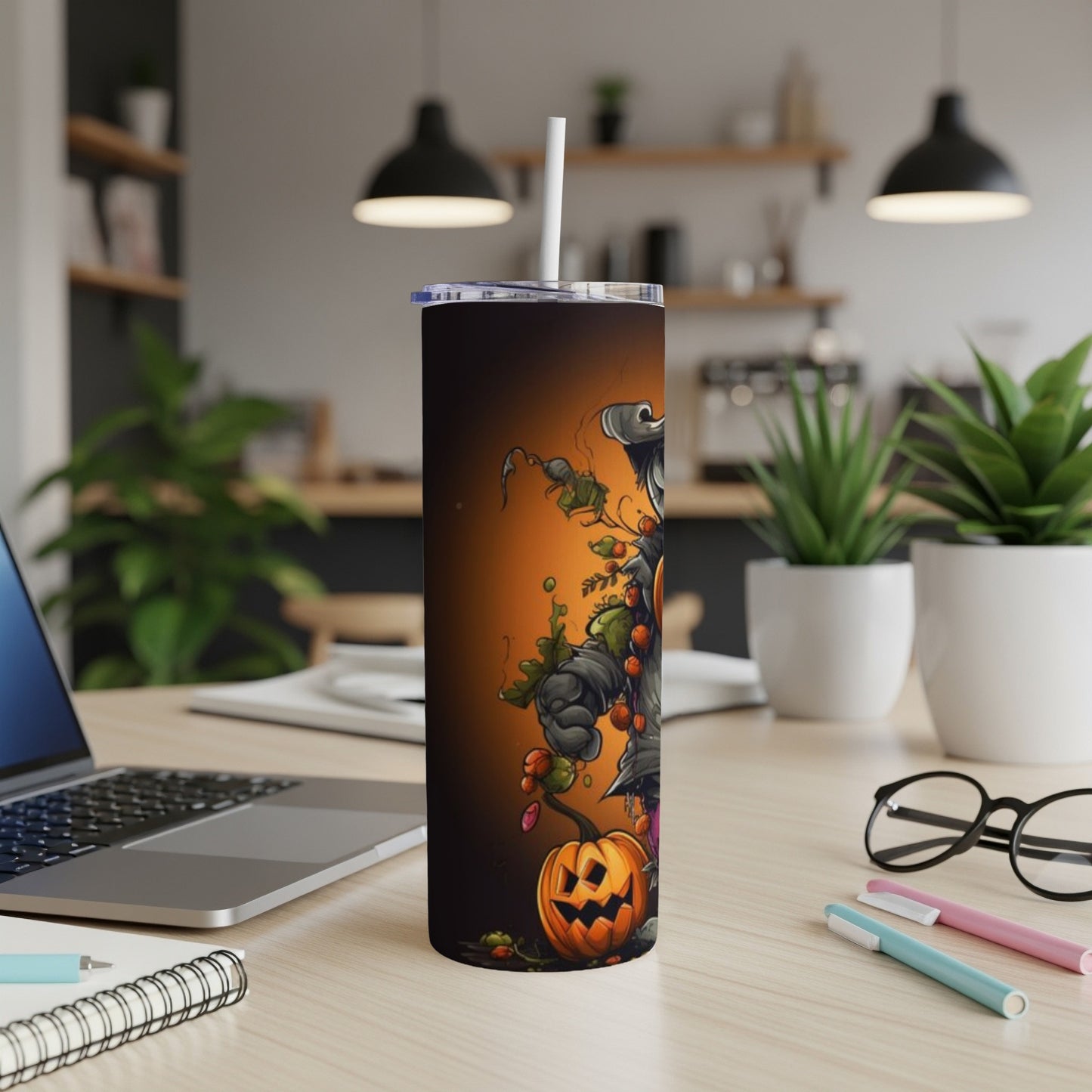 Halloween tumbler with scarecrow and jack-o'-lantern design.