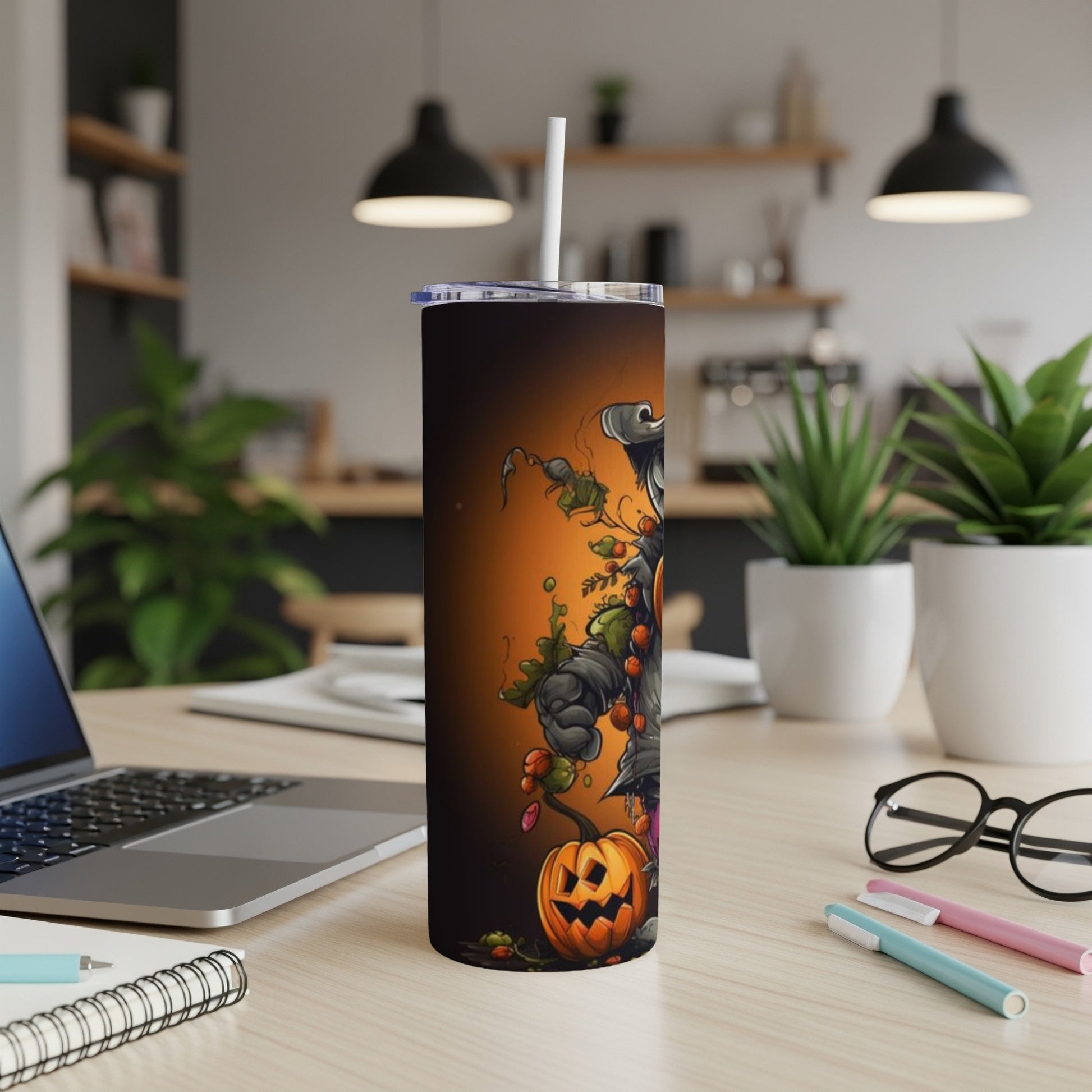 Halloween tumbler with scarecrow and jack-o'-lantern design.