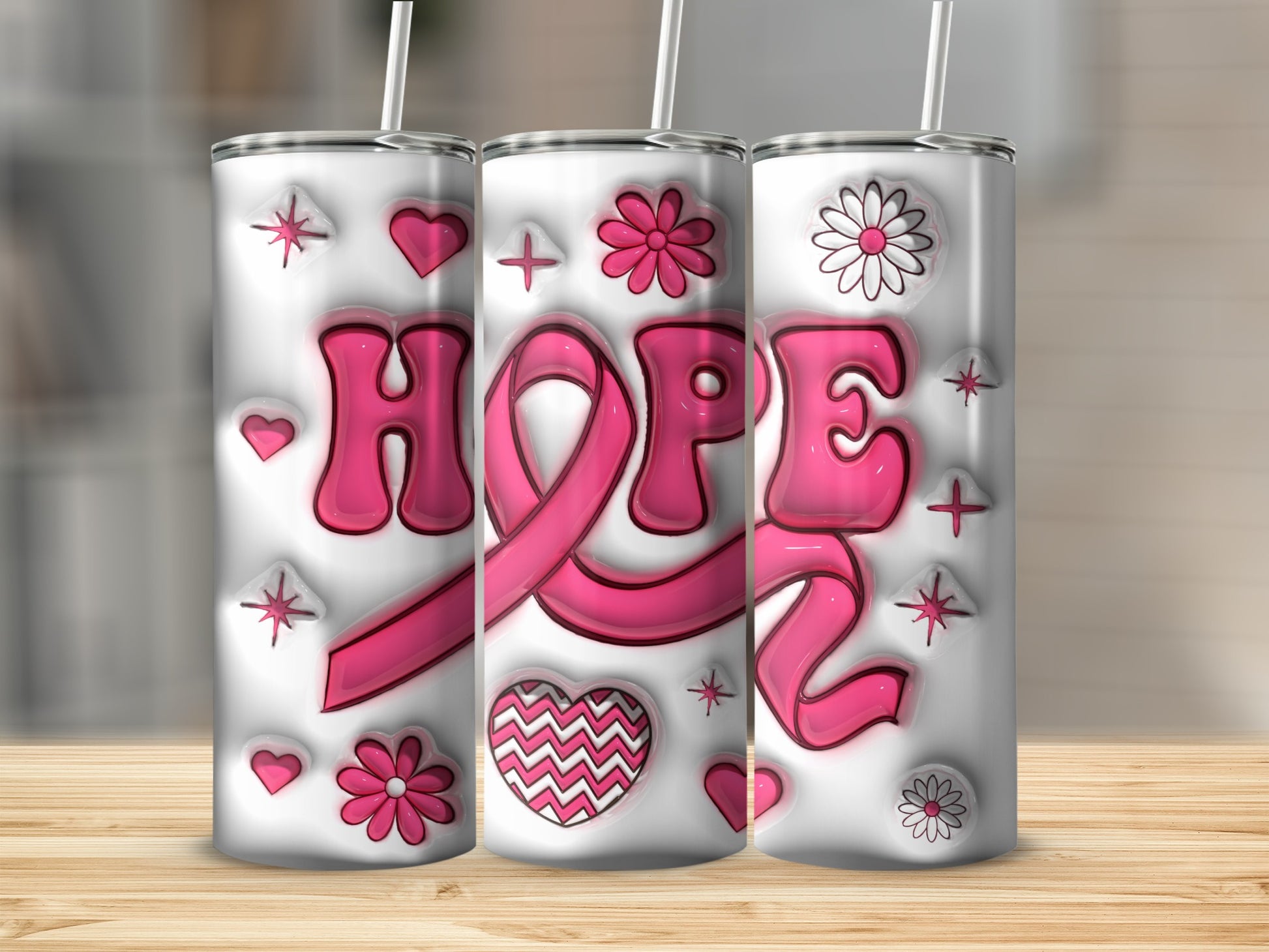 Pink ribbon with "HOPE" text, flowers, and hearts on a white tumbler.