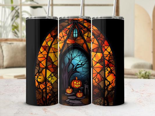 Tall tumbler with stained glass Halloween scene, jack-o'-lanterns, and spooky tree.
