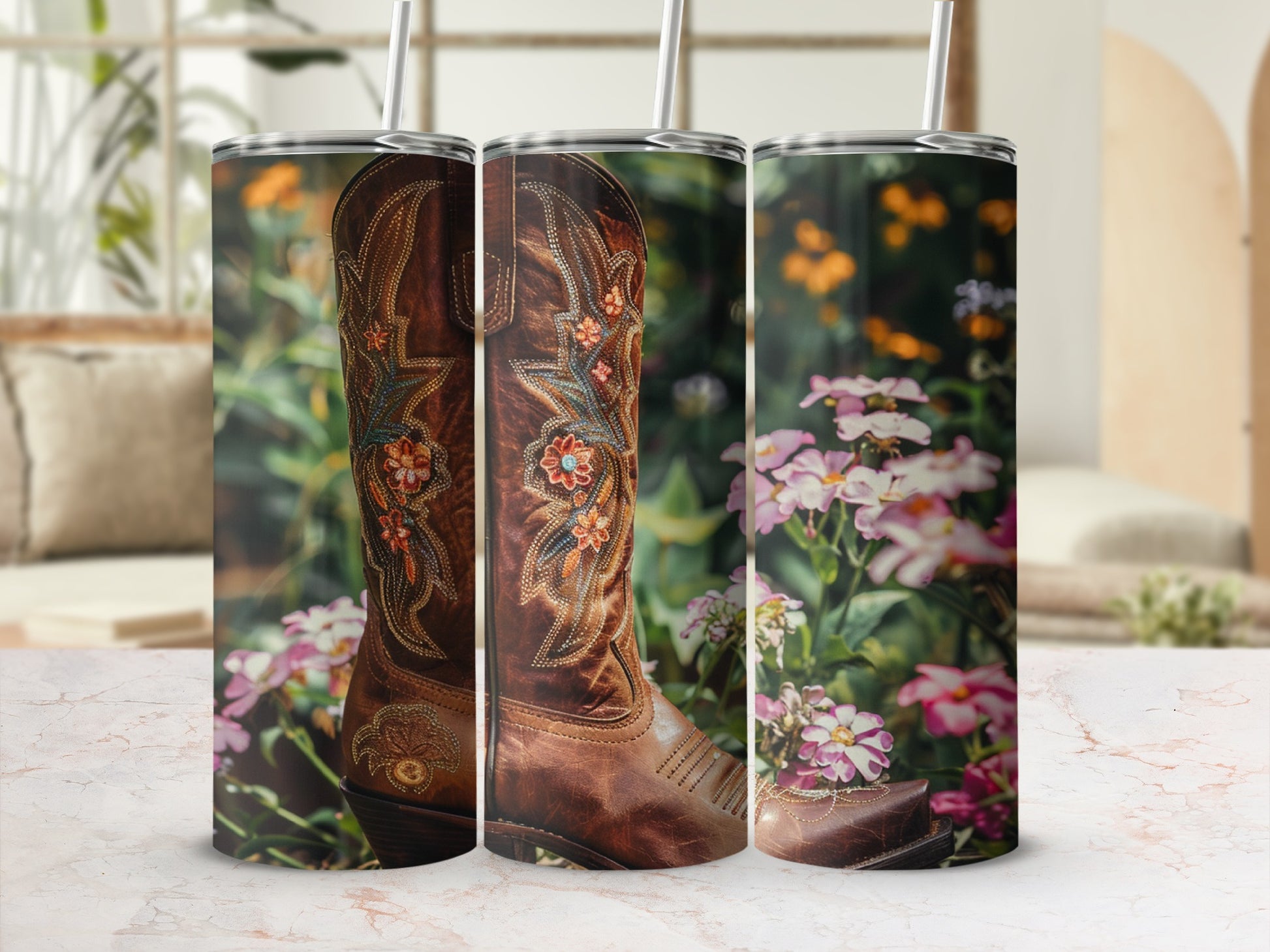 Brown leather cowboy boot with floral embroidery, shown on a marbled surface.