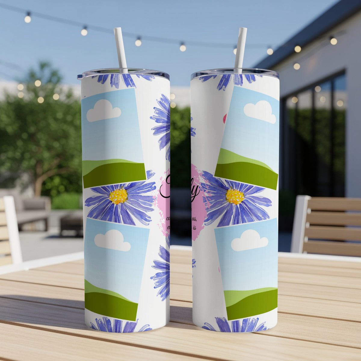 Two tumblers with a floral and landscape design, featuring the word "Family".