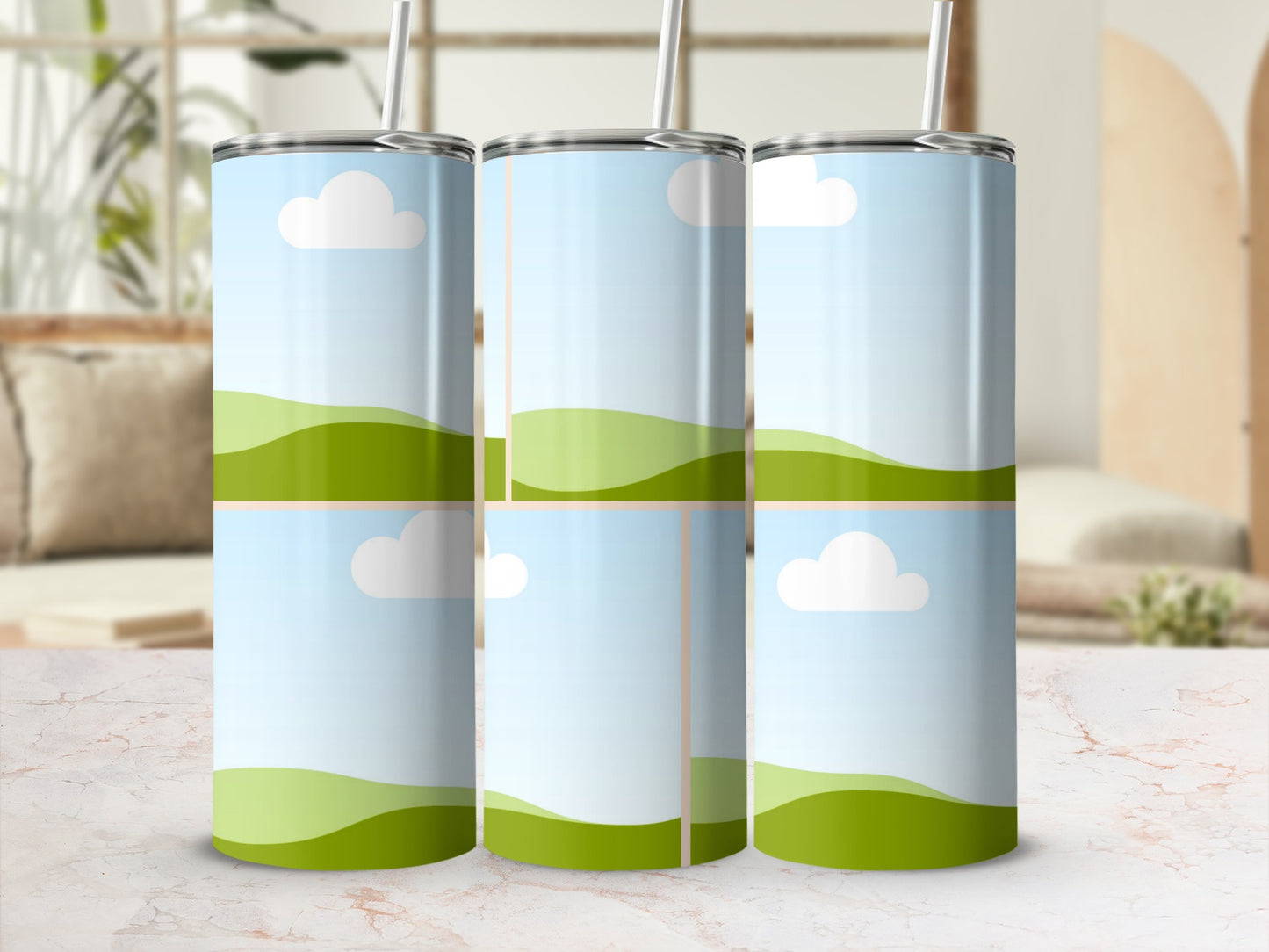 Three tumblers with straw, featuring a stylized landscape of green hills and blue sky with clouds.