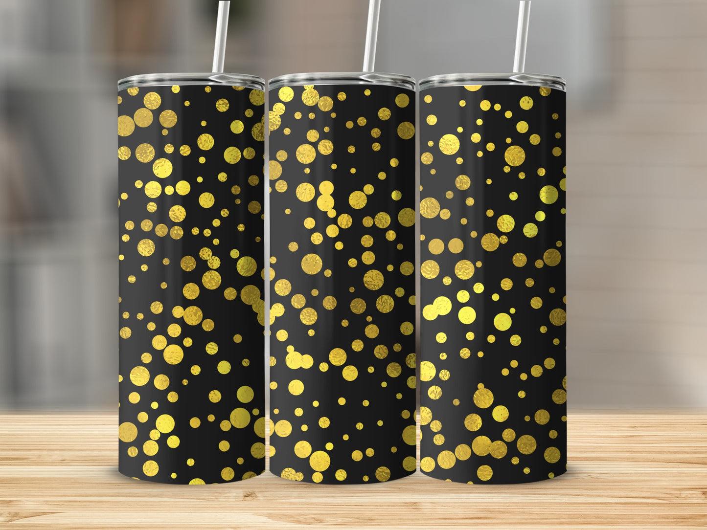 Three tumblers with a black background and scattered gold dot pattern.