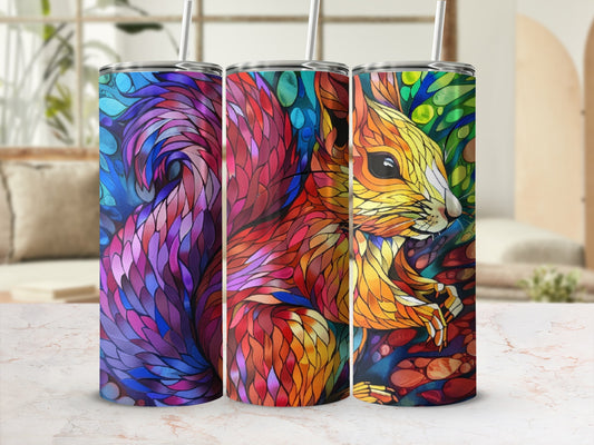 Colorful squirrel artwork on three sublimation tumblers with straws.