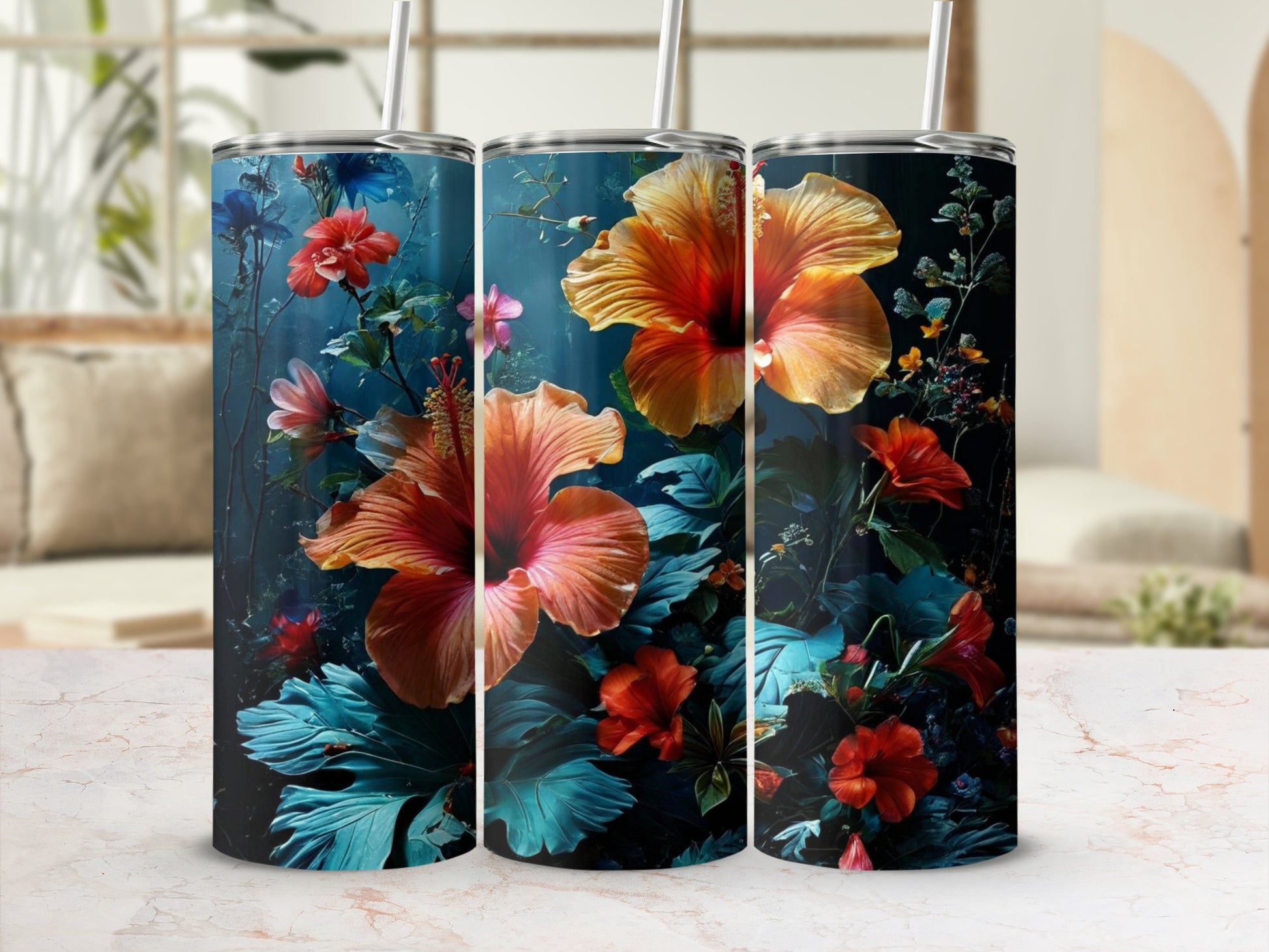 Three tumblers adorned with vibrant hibiscus flowers and dark tropical leaves.