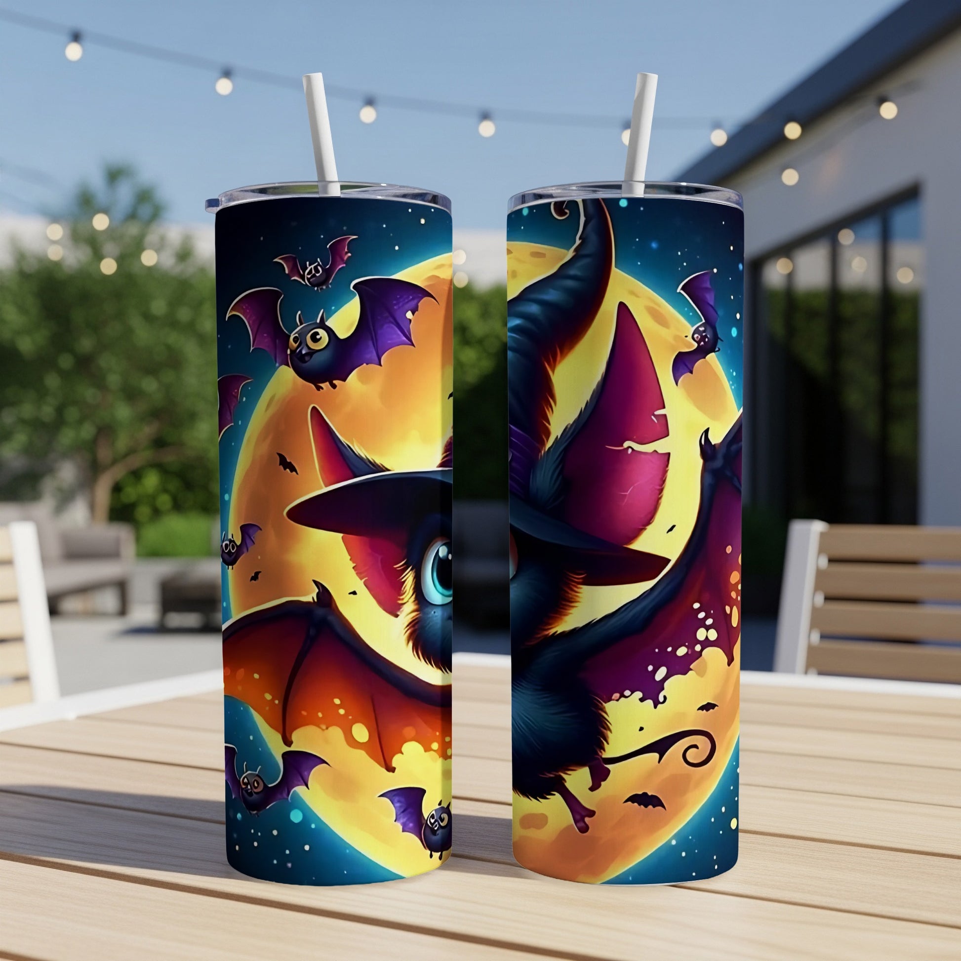 Two tumblers featuring cartoon bats flying in front of a large moon and night sky.