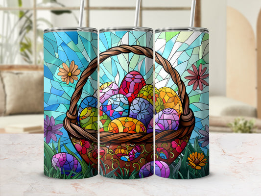 Three stained-glass style tumblers with colorful Easter eggs in a basket.