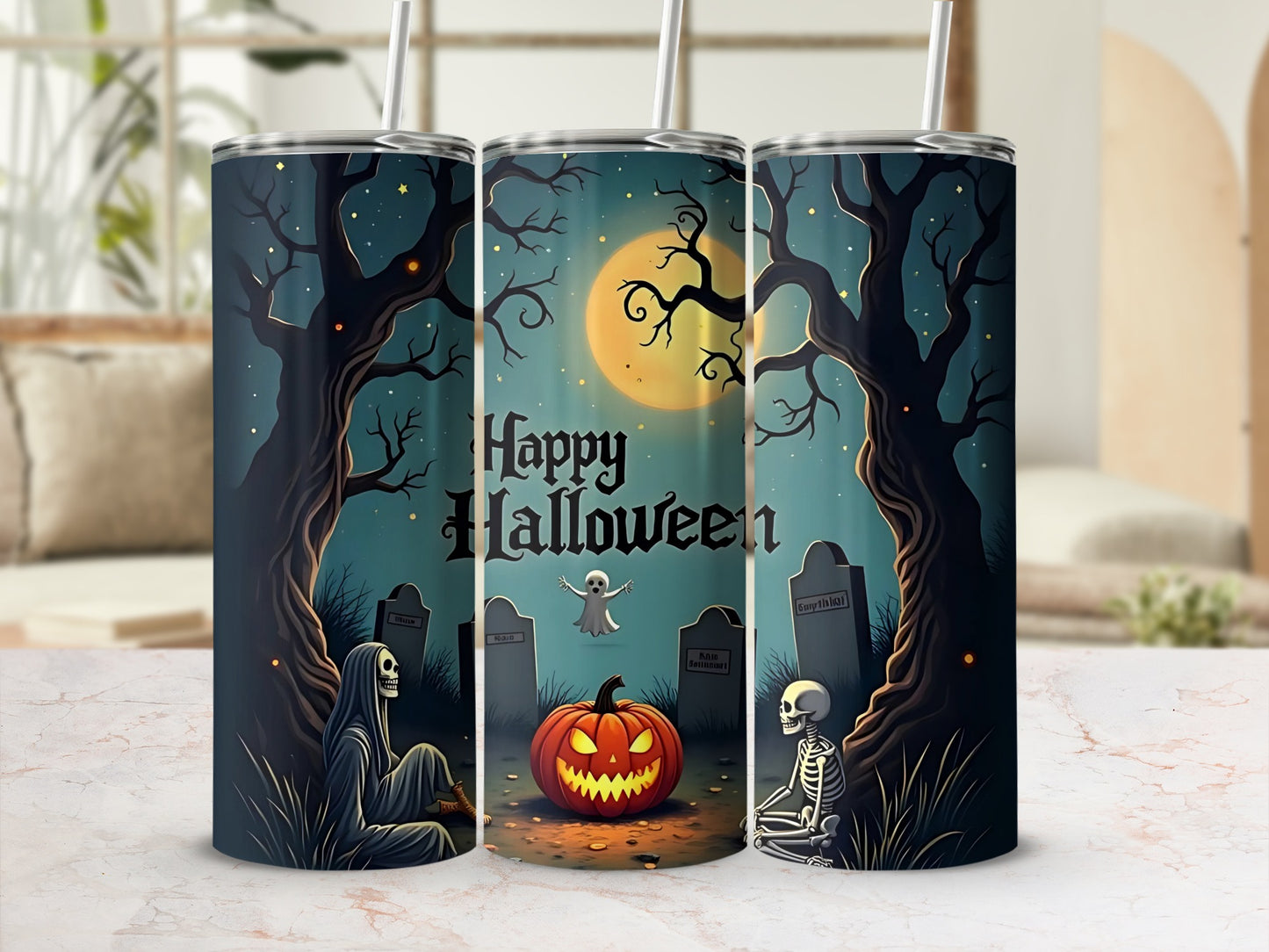 Three tumblers with a "Happy Halloween" design featuring a pumpkin, ghost, skeletons, and graves.