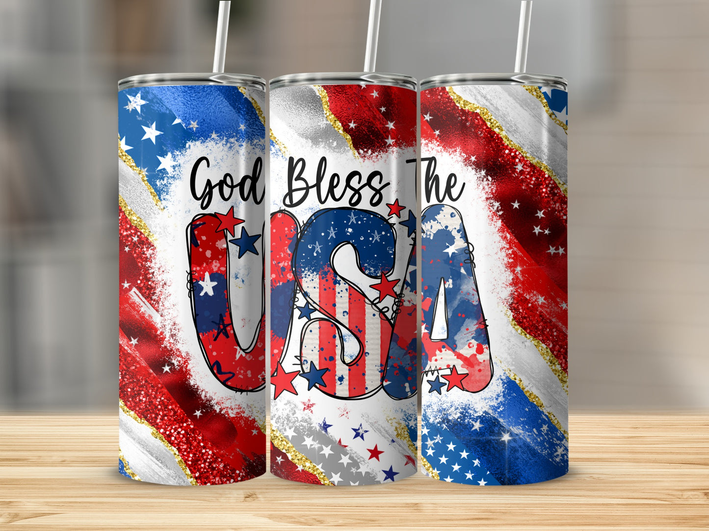 Three tumblers with "God Bless The USA" text and patriotic flag design.