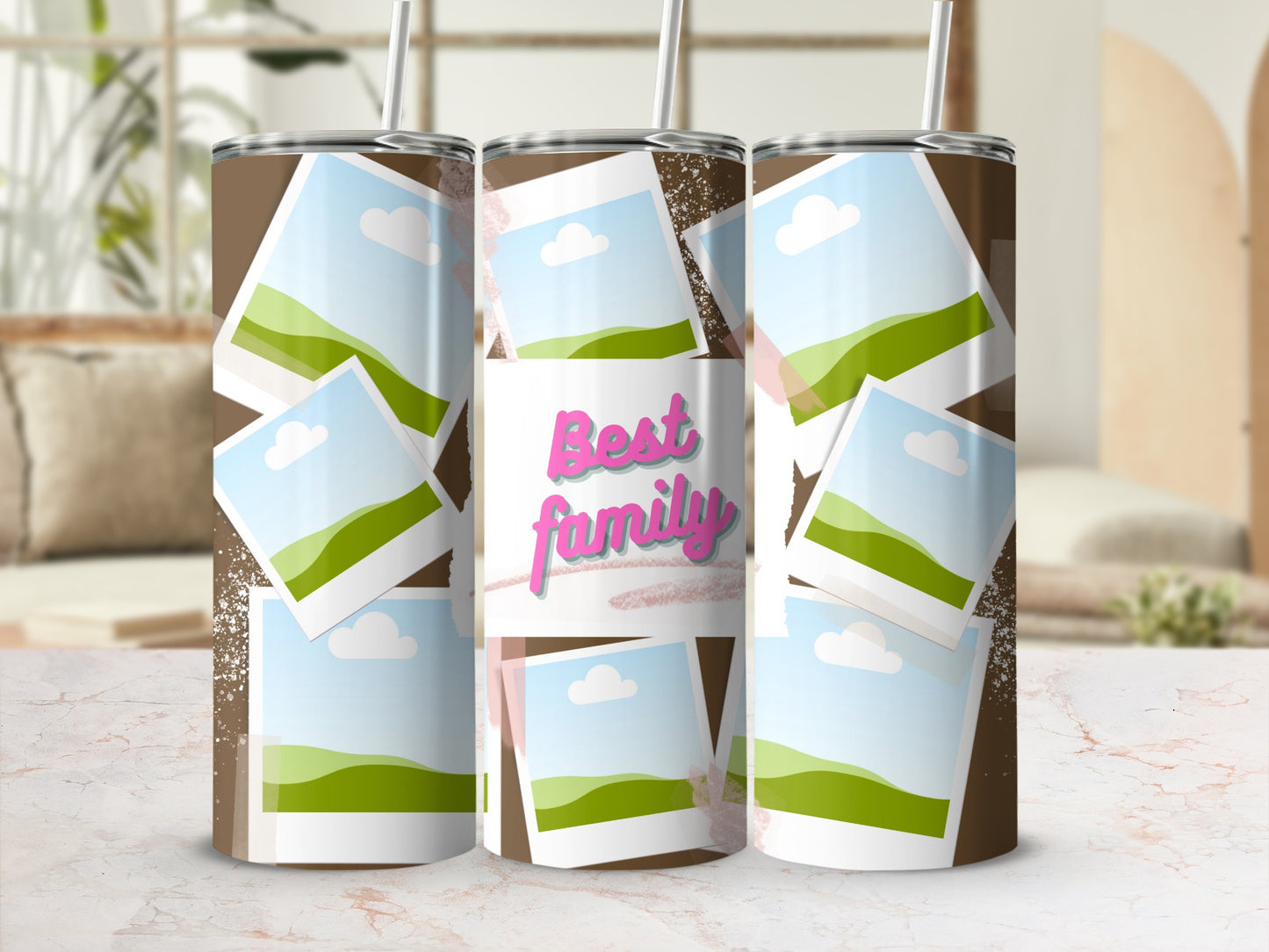 Tumbler with "Best family" text and scattered landscape photo frames.