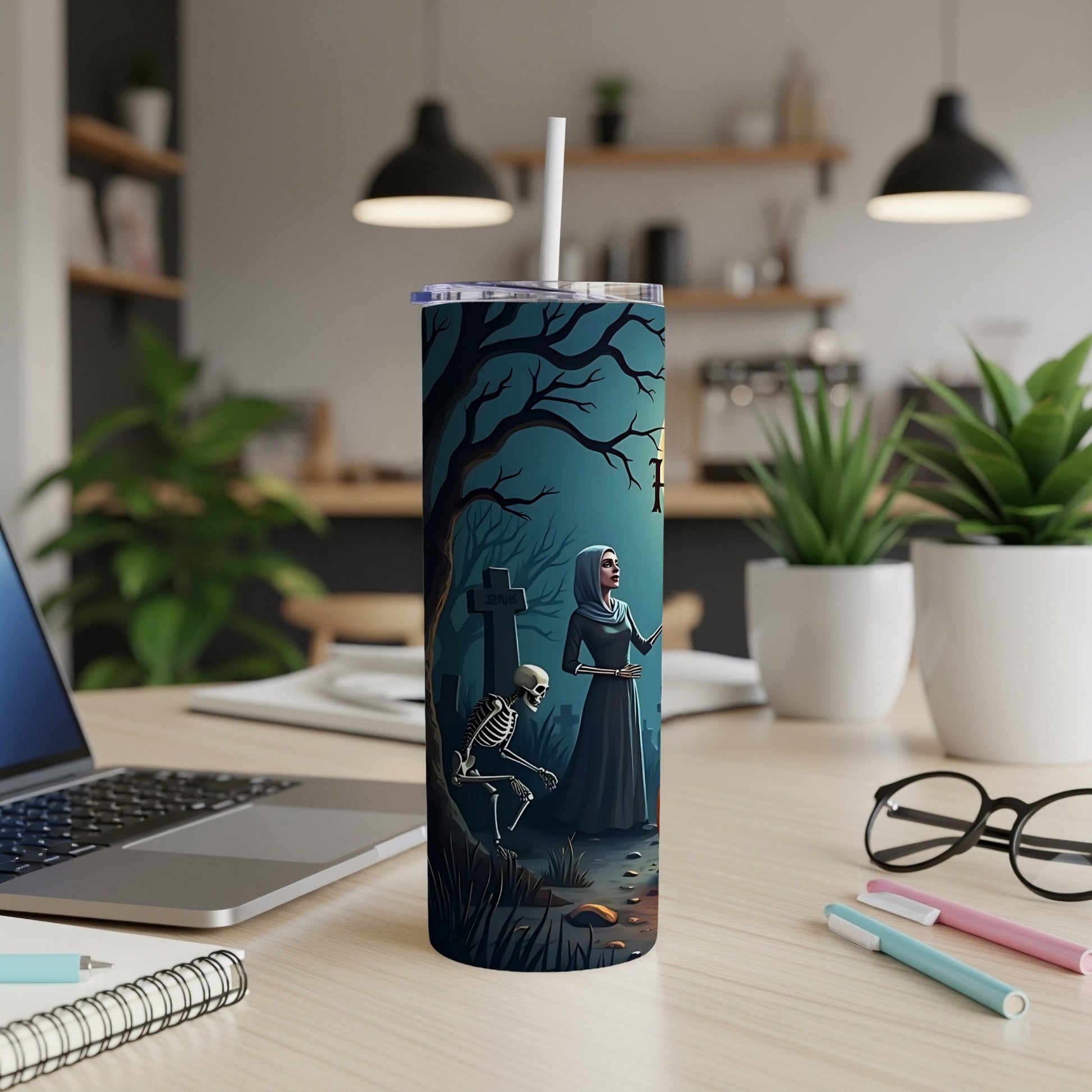 Tumbler with Halloween cemetery scene featuring a skeleton and robed figure under a bare tree.