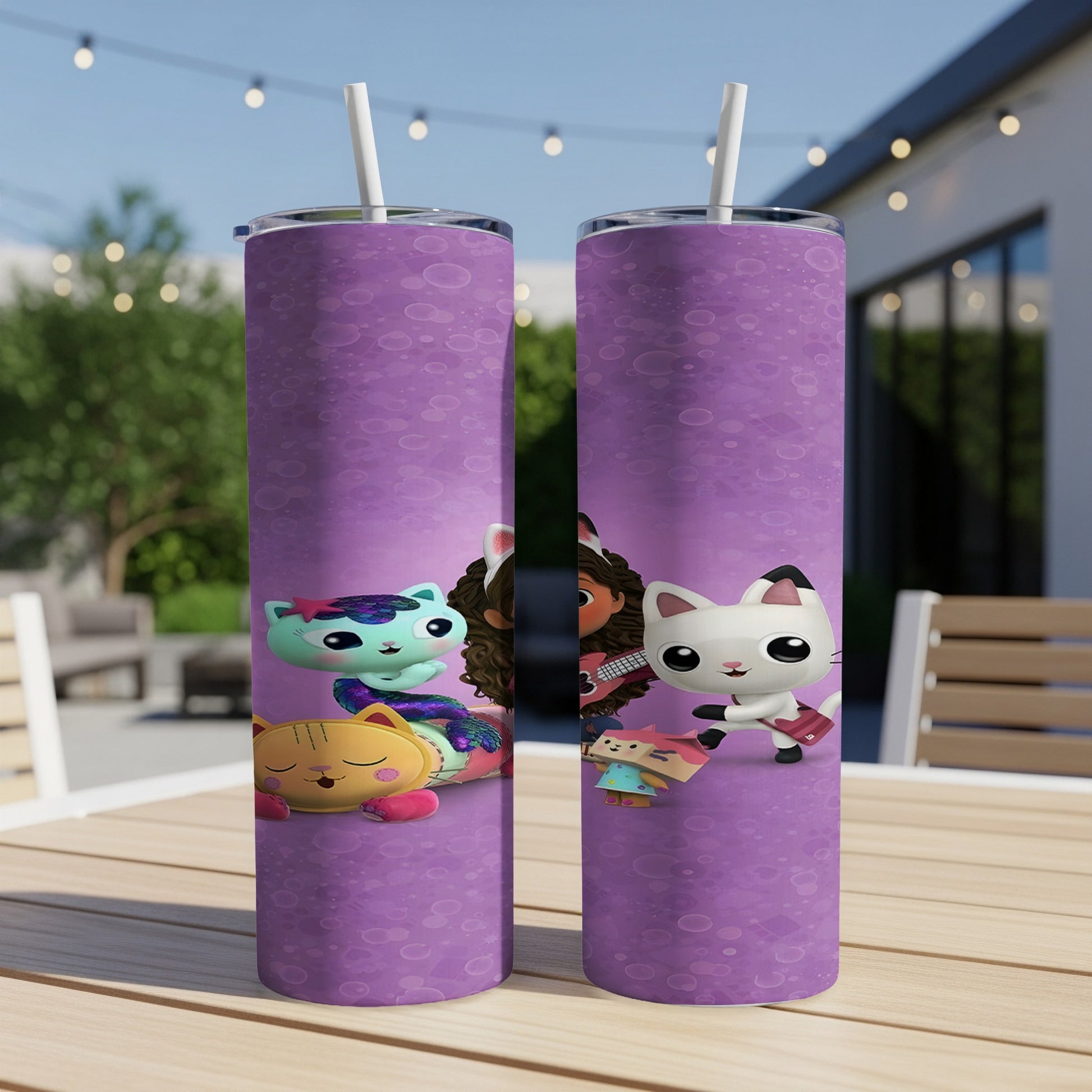 Two purple tumblers with Gabby's Dollhouse characters, Pandy Paws and CatRat.